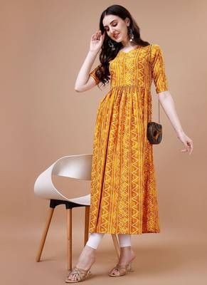 YELLOW BANDHANI FOLI PRINT DESIGN WORK WITH RAYON FABRIC KURTI  1