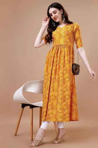 YELLOW BANDHANI FOLI PRINT DESIGN WORK WITH RAYON FABRIC KURTI 