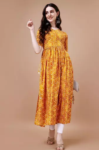 YELLOW BANDHANI FOLI PRINT DESIGN WORK WITH RAYON FABRIC KURTI 