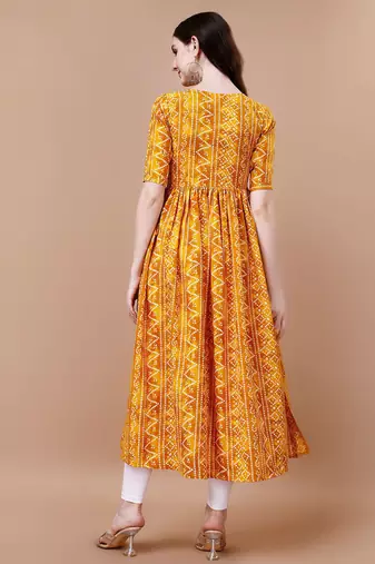 YELLOW BANDHANI FOLI PRINT DESIGN WORK WITH RAYON FABRIC KURTI 