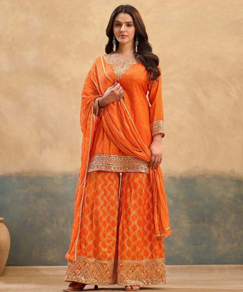 Orange viscose readymade suit with embroidery work
