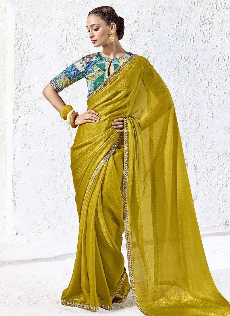 mustard yellow faux tissue saree with zari border & printed blouse