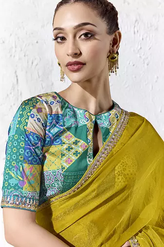 mustard yellow faux tissue saree with zari border & printed blouse