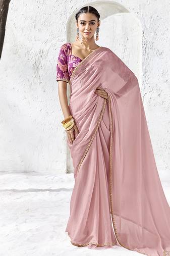 light pink faux georgette saree with golden zari border