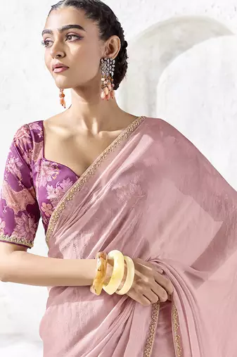 light pink faux georgette saree with golden zari border