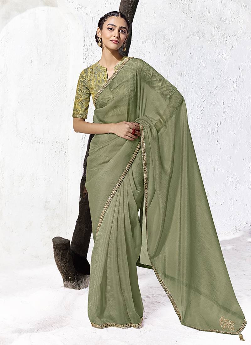 olive green faux georgette embroidered saree with designer blouse