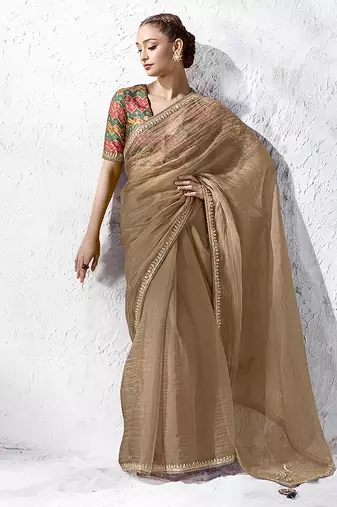 beige faux organza saree with printed blouse