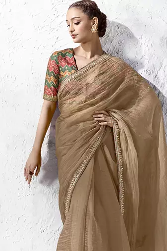 beige faux organza saree with printed blouse