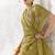 Olive green silk blend embroidered saree