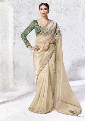cream faux organza saree with zari border & green printed blouse 1