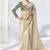 cream faux organza saree with zari border & green printed blouse