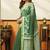 Green cotton blend printed saree with contrast border