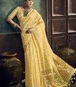 Lemon yellow faux cotton handloom saree with golden border