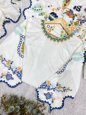 white color embroidery  work and sequins work silk blend salwar suit 2