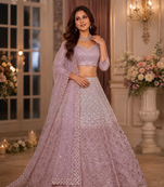 Peach color Designed Pattern Embroidered and Sequins Work net Lehenga Choli set