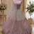 Peach color Designed Pattern Embroidered and Sequins Work net Lehenga Choli set