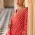 Orange chinon readymade suit with embroidery & mirror work