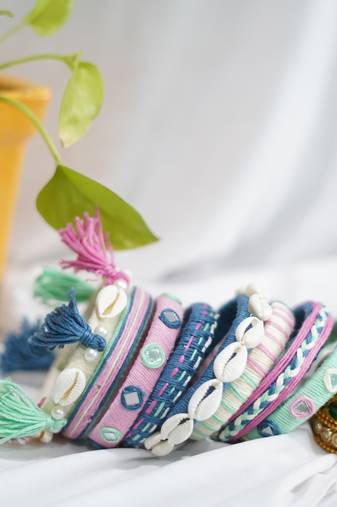 handcrafted pastel multicolour thread bangle set with cowrie shells & tassels