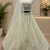 off white color Motif Crystal and Sequins work net Lehenga Choli set