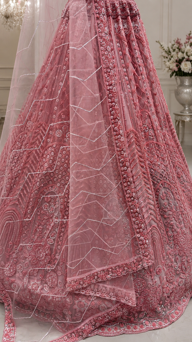 light Pink color Motif Crystal and Sequins work net Lehenga Choli set