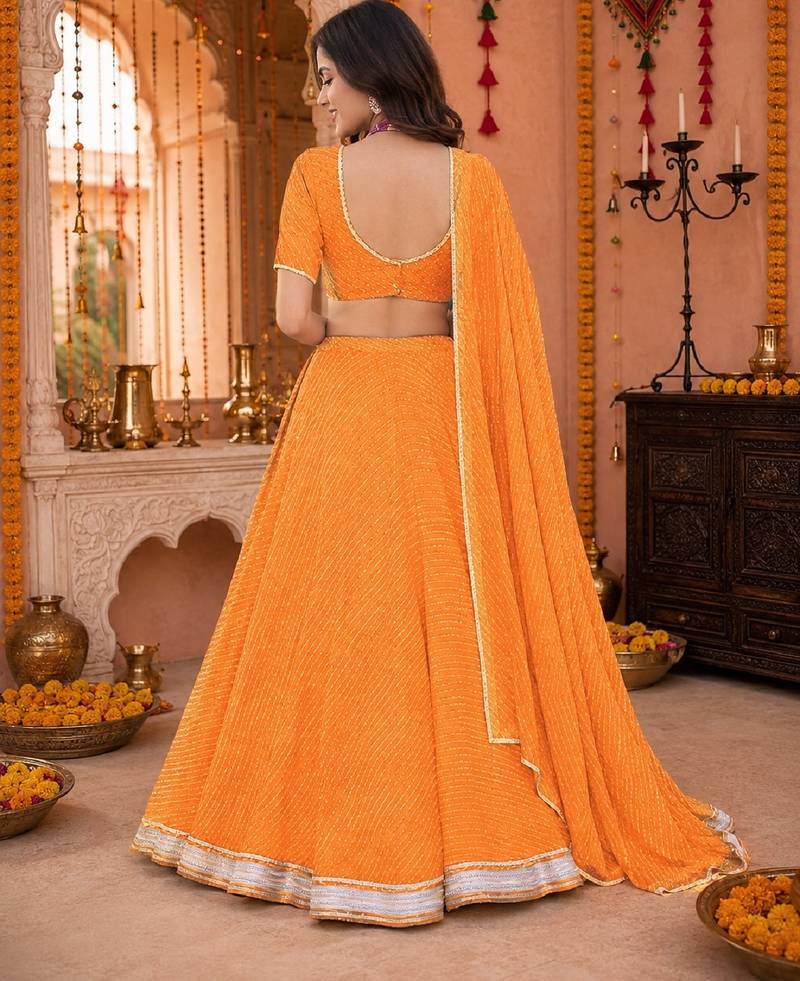 ORANGE LEHERIYA PRINT GEORGETTE LEHENGA CHOLI DUPATTA