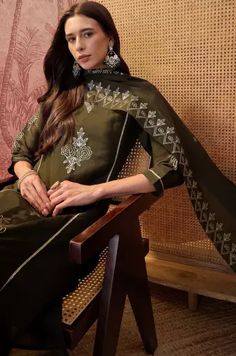 Bottle green chanderi cotton embroidered kurta set.