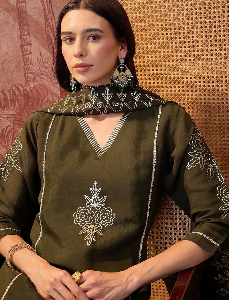 Bottle green chanderi cotton embroidered kurta set.