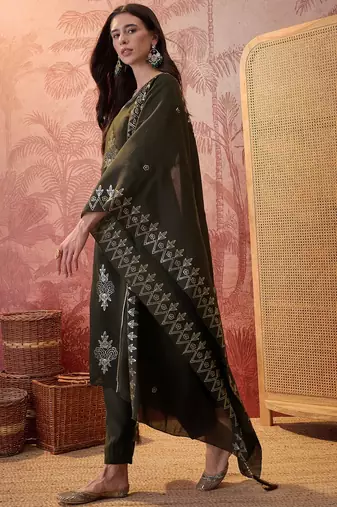 Bottle green chanderi cotton embroidered kurta set.