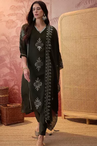 Bottle green chanderi cotton embroidered kurta set.