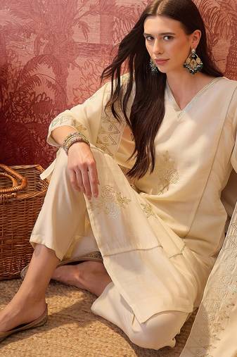 Cream chanderi cotton embroidered kurta set.