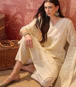 Cream chanderi cotton embroidered kurta set.