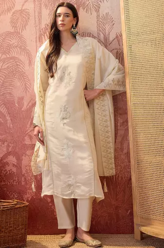 Cream chanderi cotton embroidered kurta set.