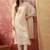 Cream chanderi cotton embroidered kurta set.