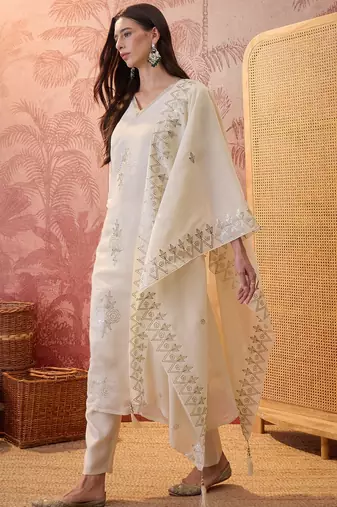 Cream chanderi cotton embroidered kurta set.