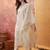 Cream chanderi cotton embroidered kurta set.