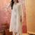 Cream chanderi cotton embroidered kurta set.