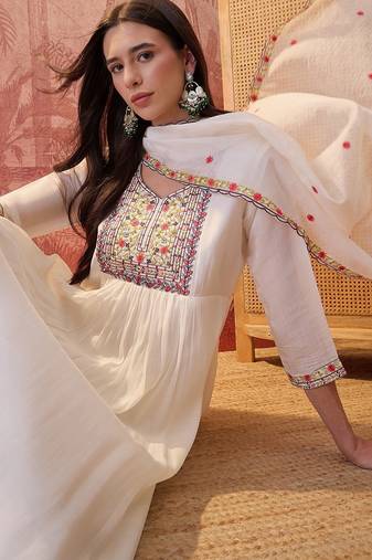 Cream chanderi cotton embroidered kurta set.