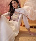 Cream chanderi cotton embroidered kurta set.