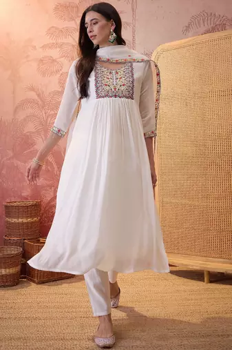 Cream chanderi cotton embroidered kurta set.