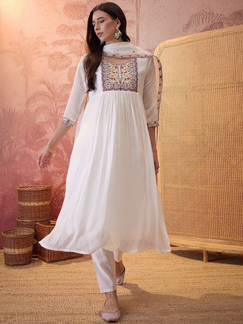 Cream chanderi cotton embroidered kurta set.