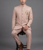 Pink textured bandhgala suit for men