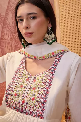 Cream chanderi cotton embroidered kurta set.
