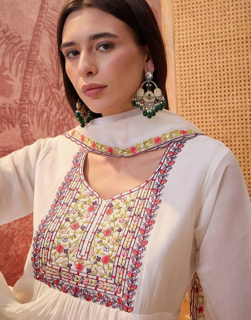 Cream chanderi cotton embroidered kurta set.