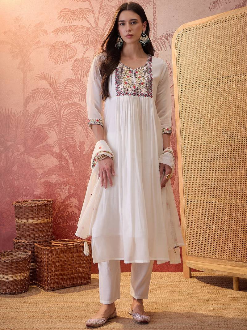 Cream chanderi cotton embroidered kurta set.