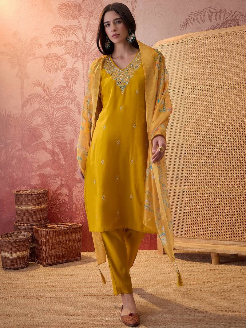Mustard chanderi cotton embroidered kurta set.