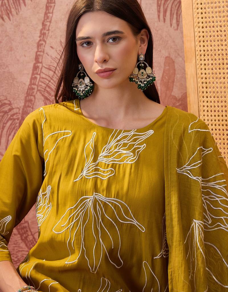 Olive chanderi cotton embroidered kurta set.