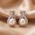 925 sterling silver luminous pearl swirl pendant set with earrings