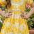 Yellow and white printed cotton festive wear kurta set