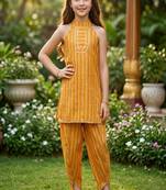 Mustard and golden printed cotton festive wear kurta set