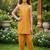Mustard and golden printed cotton festive wear kurta set